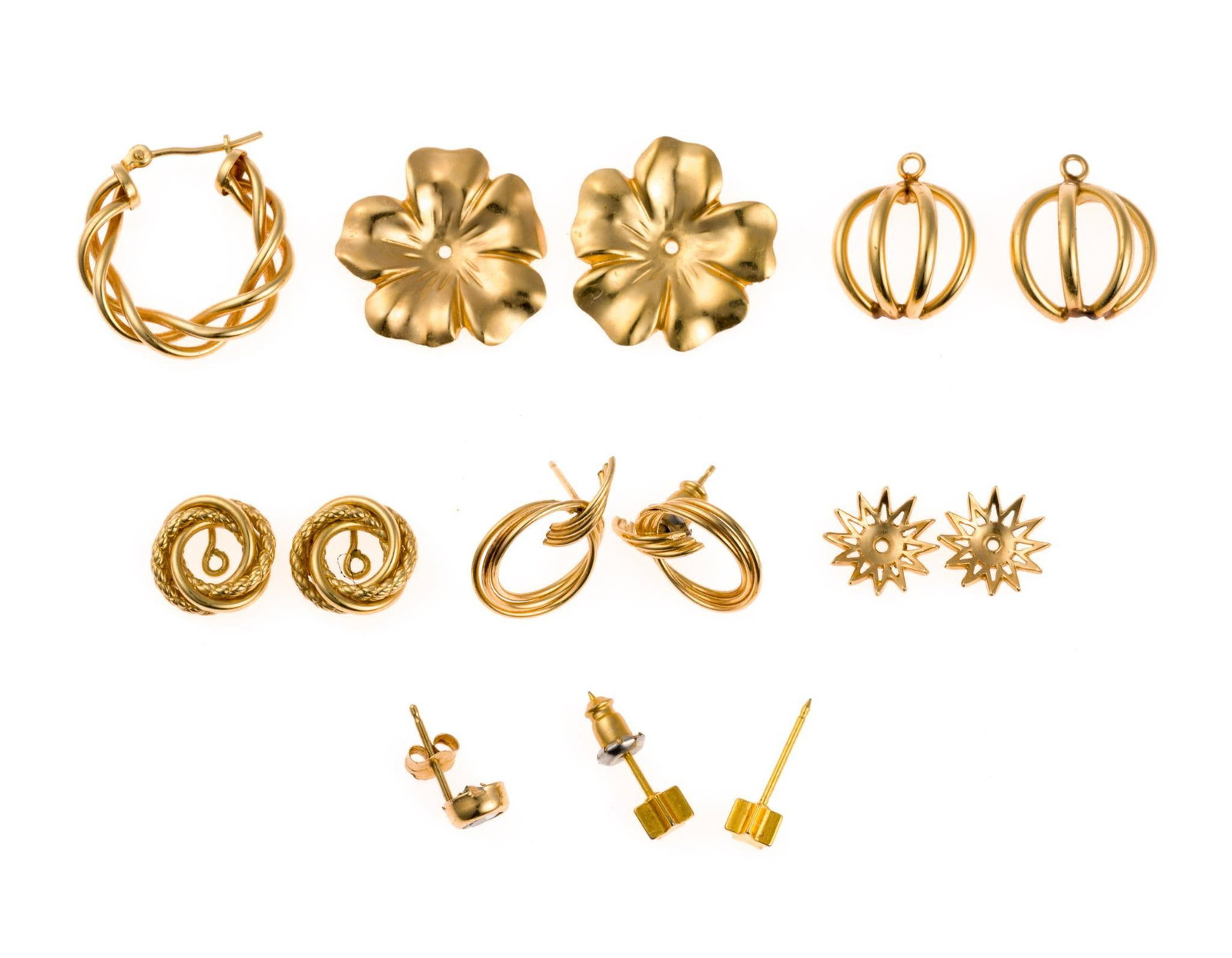 14K Gold Earrings and Earring Jackets: Six earring jackets in 14k yellow gold and one pair of jackets, the love knot style ones, are 10k yellow gold, all determined by testing. There are also four 14k gold earrings of which two are loners.