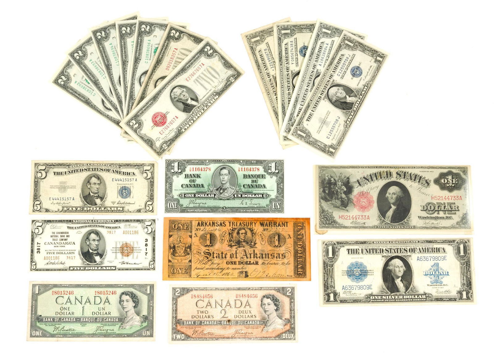 Nineteen Vintage Bills Including 1917 and 1923: The 1917 large bill legal tender note is in near uncirculated condition without creases. Also there is a 1929 $5 Canandaigua, NY brown seal National Currency. It is near mint and has a crease.