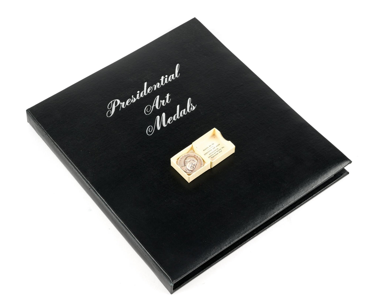 Silver Medallic Arts Presidential Art Medals: Forty are in the presentation book and one additional, Bill Clinton, is loose. These are pure silver medallions and one weighs 24.5 grams, .79 troy ounces, 32.4 troy ounces total.