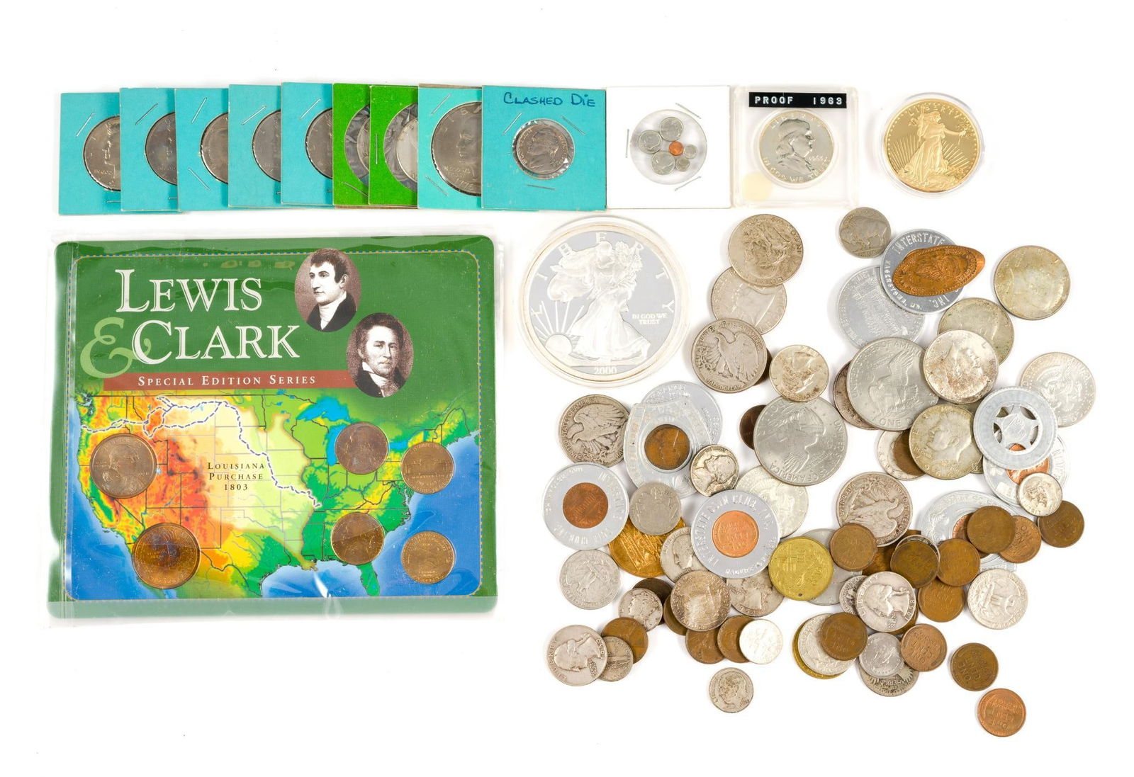 Coins And Tokens Including Silver Half Dollars: Both the over-size Walking Liberty Token and the 1933 Saint Gaudens, which is a token are unmarked, assumed to not be silver.
