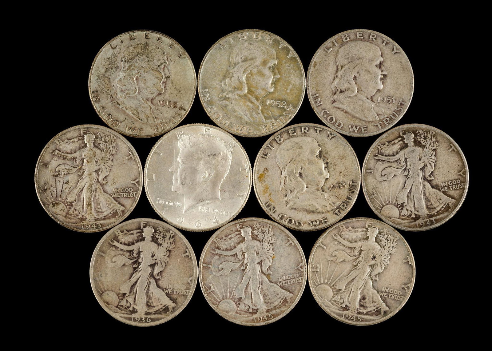 Ten Silver Half Dollars: The lot is mixed Walking Liberty, Franklin, and 1964 Kennedy.