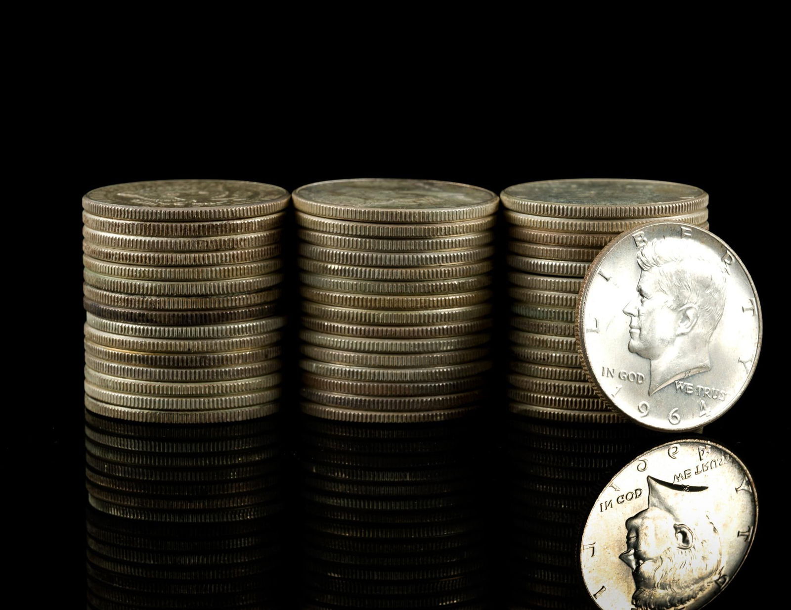 Forty Six Silver Kennedy Halves: All are uncirculated or AU 1964.