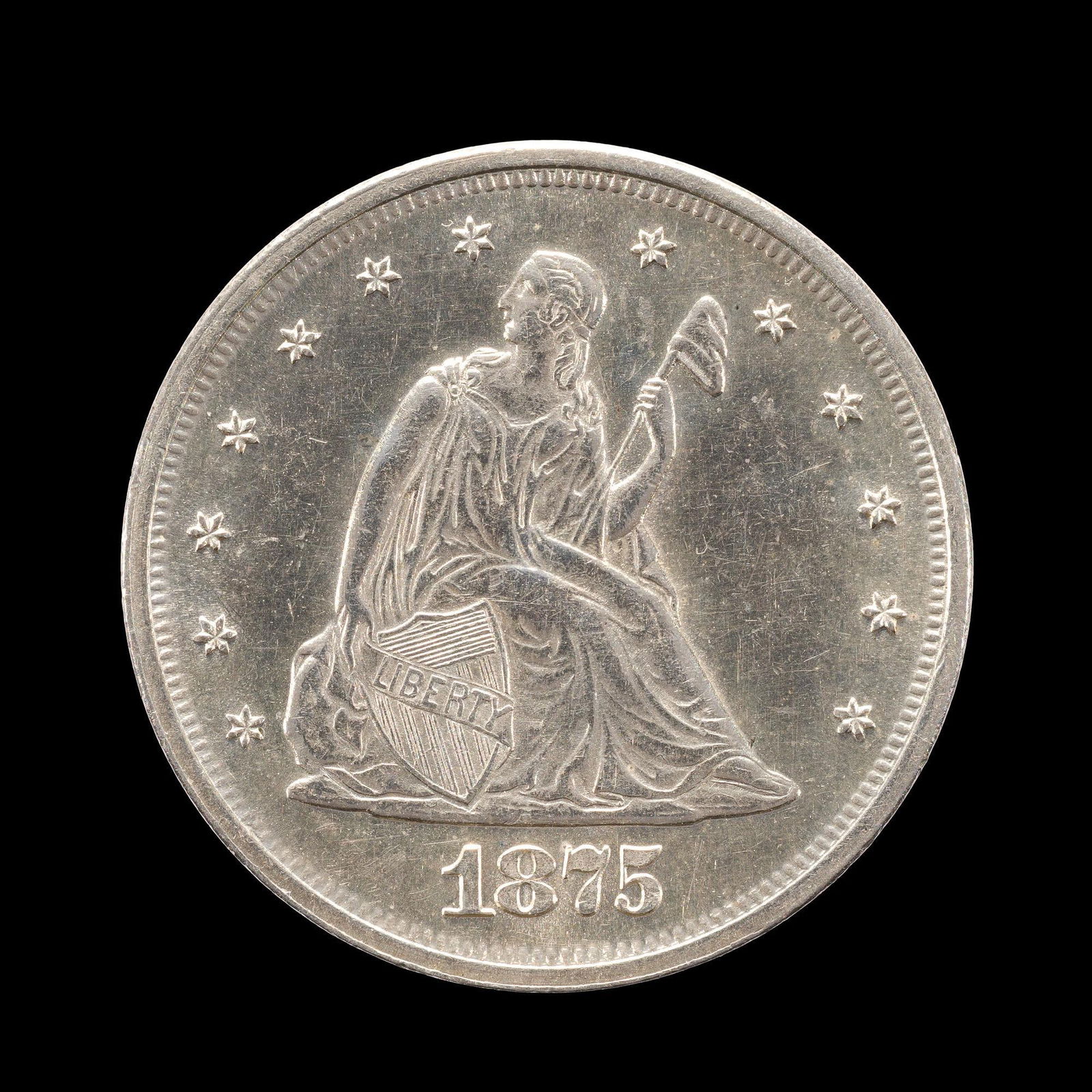 1875 Twenty Cent Silver Coin: An 1875 20 Cent, a condition rarity for the 20 cent silver, AU to uncirculated. From a high end, silver and copper United States type set with nearly every major coin type from 1794 through the mid 19
