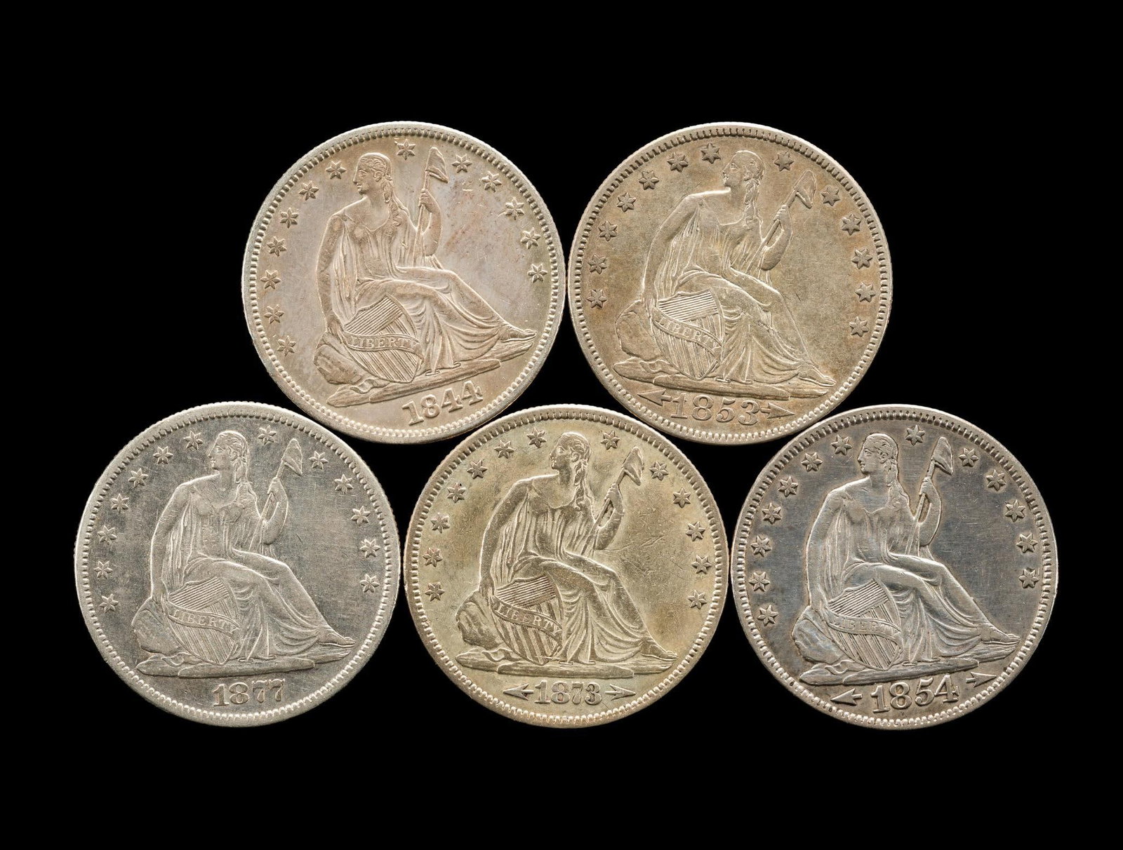 Set Of Five Seated Liberty Half Dollars: 1844 No Motto, 1853 Arrows And Rays, 1854 Arrows, 1873 Motto Arrows, 1877 Motto. All are XF to AU with no surface problems seen. From a high end, silver and copper United States type set with nearly e