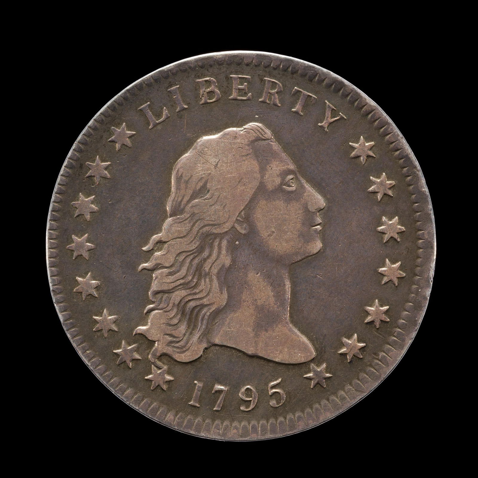 1795 Flowing Hair Dollar: A 1795 dollar, Two Leaves, VF25 -30 with no surface problems identified. From a high end, silver and copper United States type set with nearly every major coin type from 1794 through the mid 1900's.