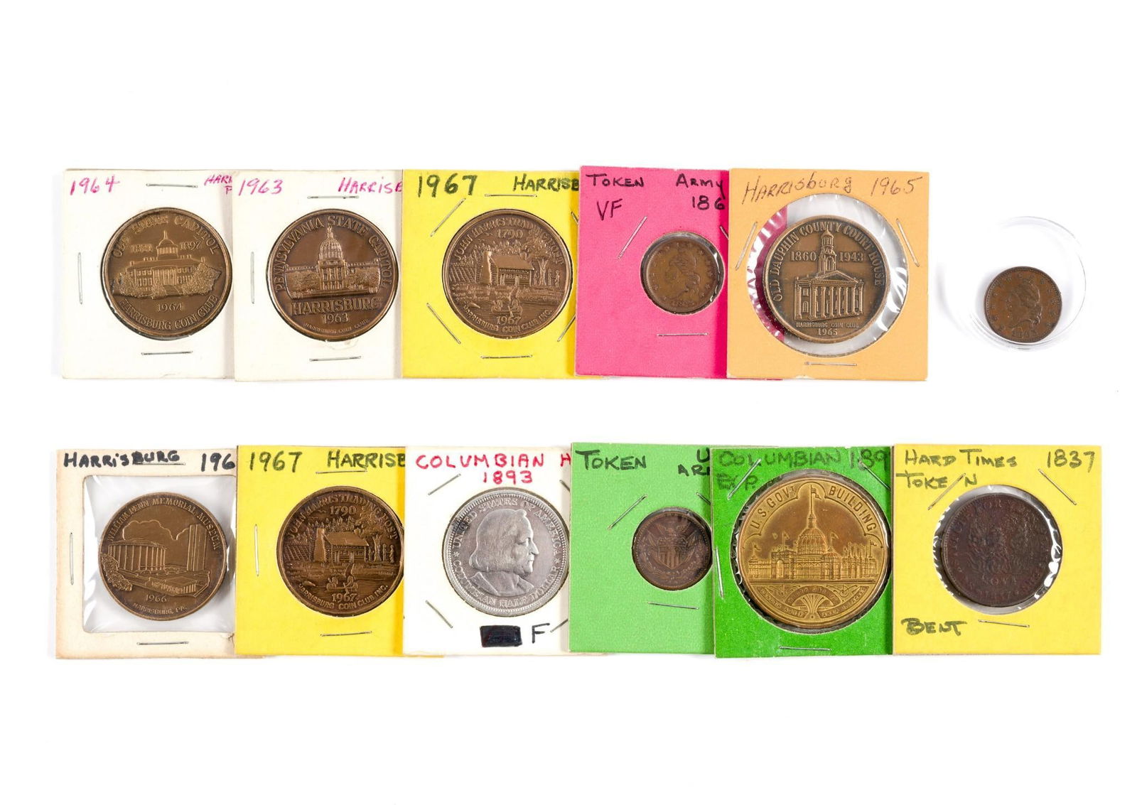 Tokens Incl. Army Navy 1863 And 1893 Silver Half Dollar: The half dollar is the Columbian commemorative 1893 and has past cleaning evidence. One of the Army Navy 1863 tokens is uncirculated with a few small contact marks, approximately MS62. Also there are