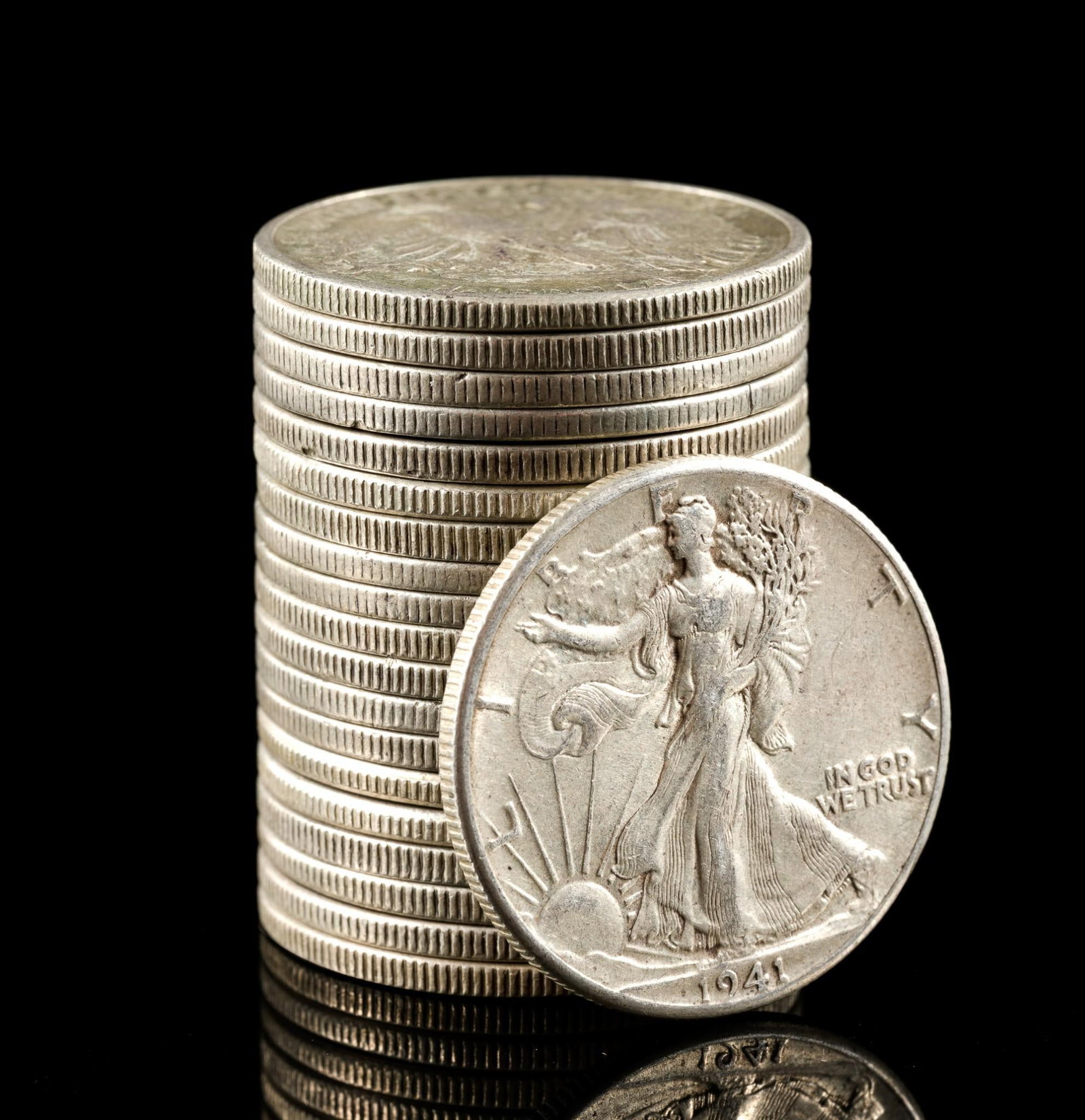 Twenty Silver Walking Liberty Half Dollars: Earlier coins have substantial wear while later coins may be AU or uncirculated.