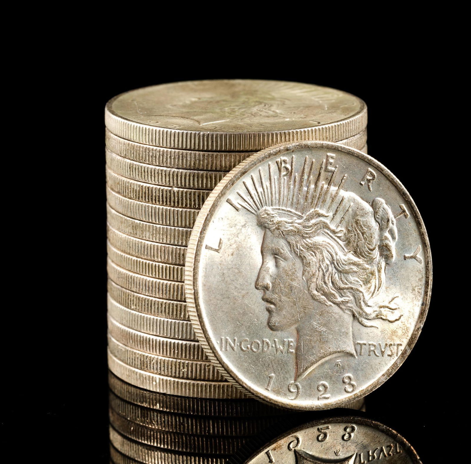 Fifteen Silver Dollars: All are Peace Dollars.