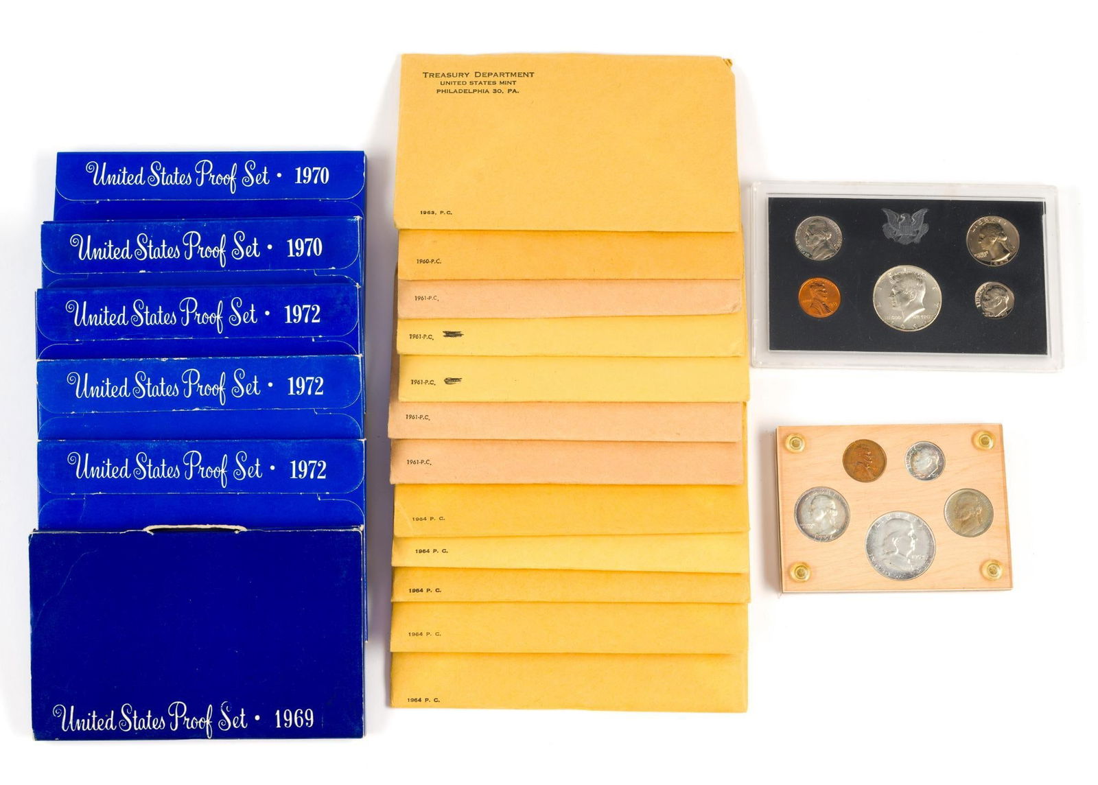 Twenty Mint and Proof Sets Silver: Fifteen of the twenty sets are pre-1965 silver sets.