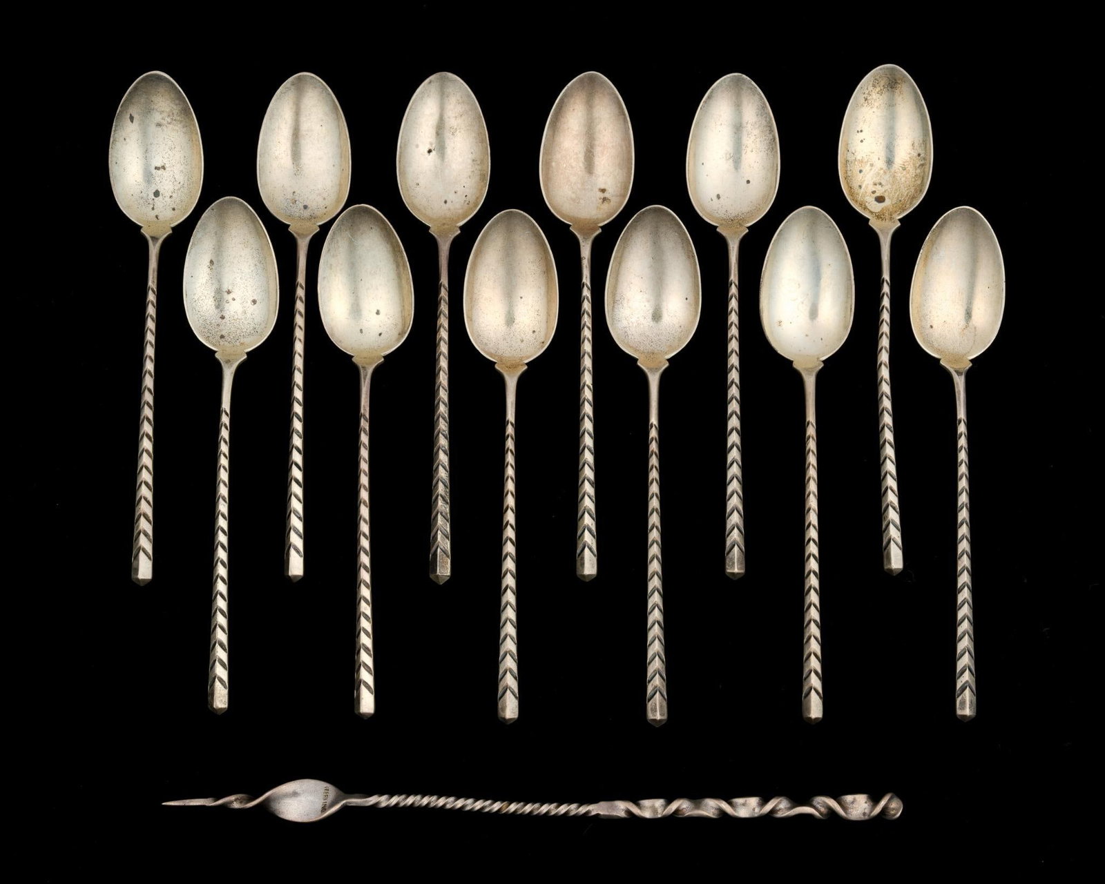 12 Sterling Silver Spoons & Sterling Silver Butter Pick: All marked. Spoons measure 4-1/2" long. Butter pick measures 6-1/2" long. 3.86 ozt total.