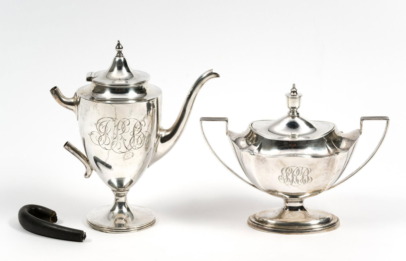 Sterling Silver Tea Pot & Sterling Silver Sugar Dish: One marked Gorham and other marked Wilcox & Wagoner. Tea pot handle is not attached. 6-3/4" to 7-3/4" wide x 6-1/4" to 8-1/4" high. 17.45 ozt total.