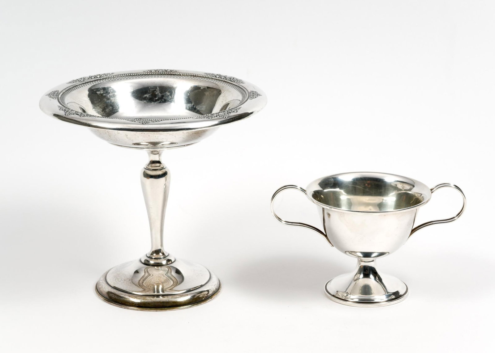 2 Pcs Weighted Sterling Silver: Both marked. 5" to 6" wide x 3" to 5-1/4" high. 9.63 ozt total.