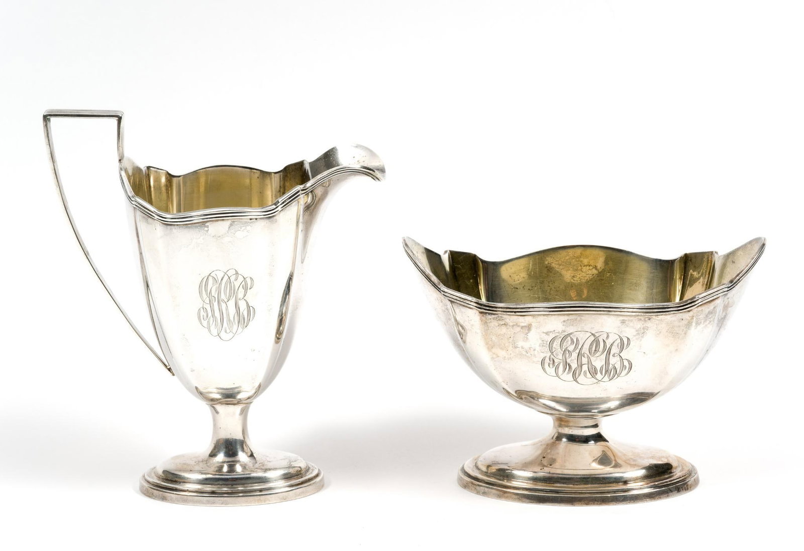 Gorham Sterling Silver Cream and Sugar: Both marked. 5" to 5-1/2" wide x 3-7/8" to 6" high. 12.12 ozt total.