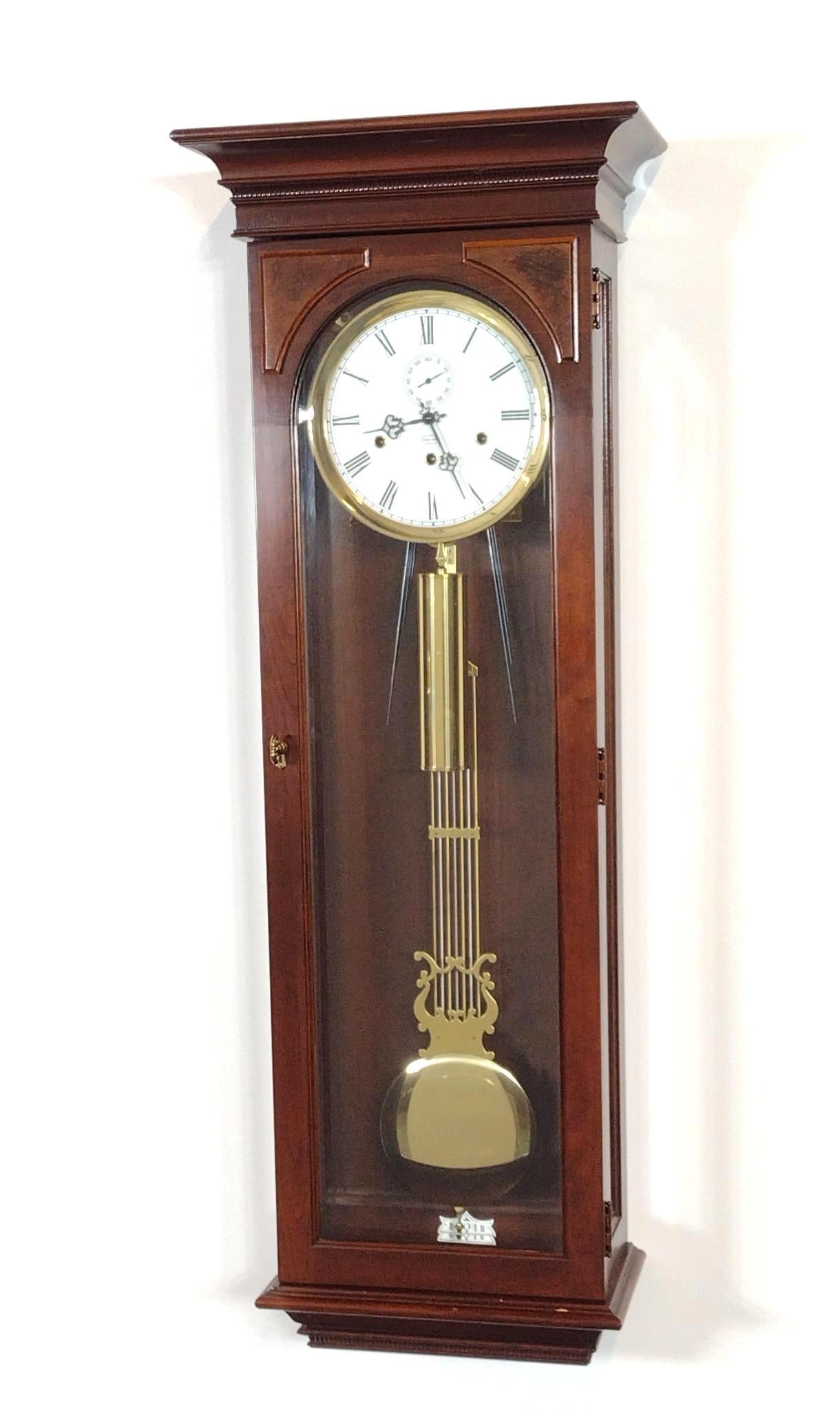 Ethan Allen Wall Clock: 17-1/4" wide X 9" deep X 47" high. Working.