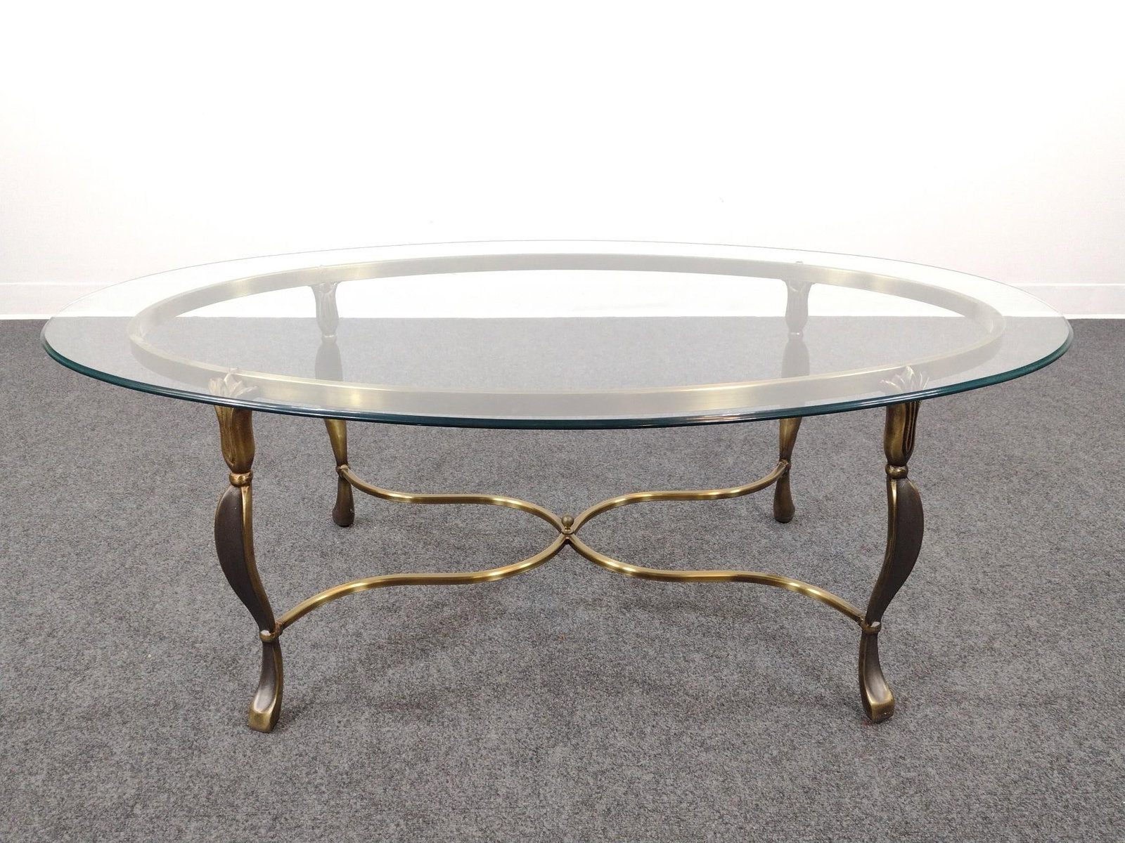 Glass Top Coffee Table W/ Brass Base: 52" wide X 33" deep X 18-1/4" high. No manufactures name found.