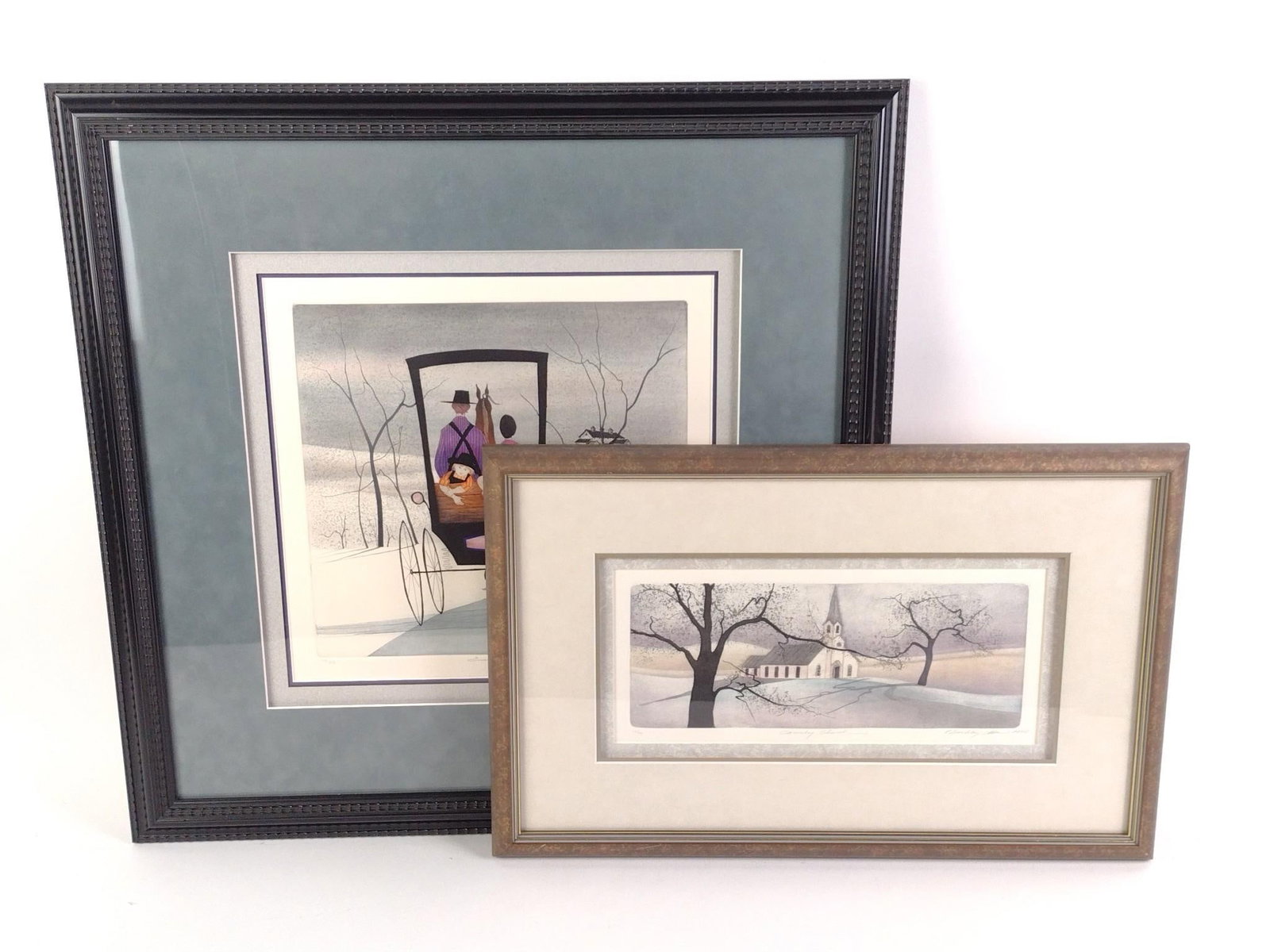 2 P. Buckley Moss Prints Incl. "Country Church": Also includes "Even Ride." Both works are signed and numbered. "Country Church" measures 20 - 3/4" by 13 - 1/4" with frame, sight measures 13" by 6". "Even Ride" measures 23 - 3/4" by 23 - 1/4" with