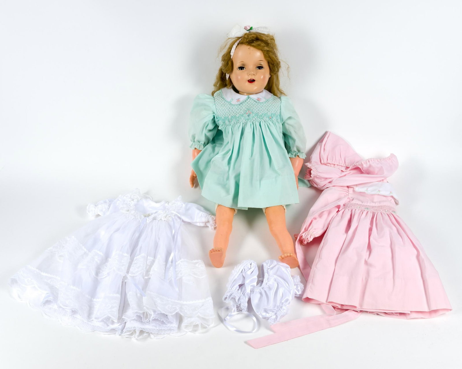 Vintage Baby Doll Incl.Two Dresses: Eyes open and close, no manufacturer or date.