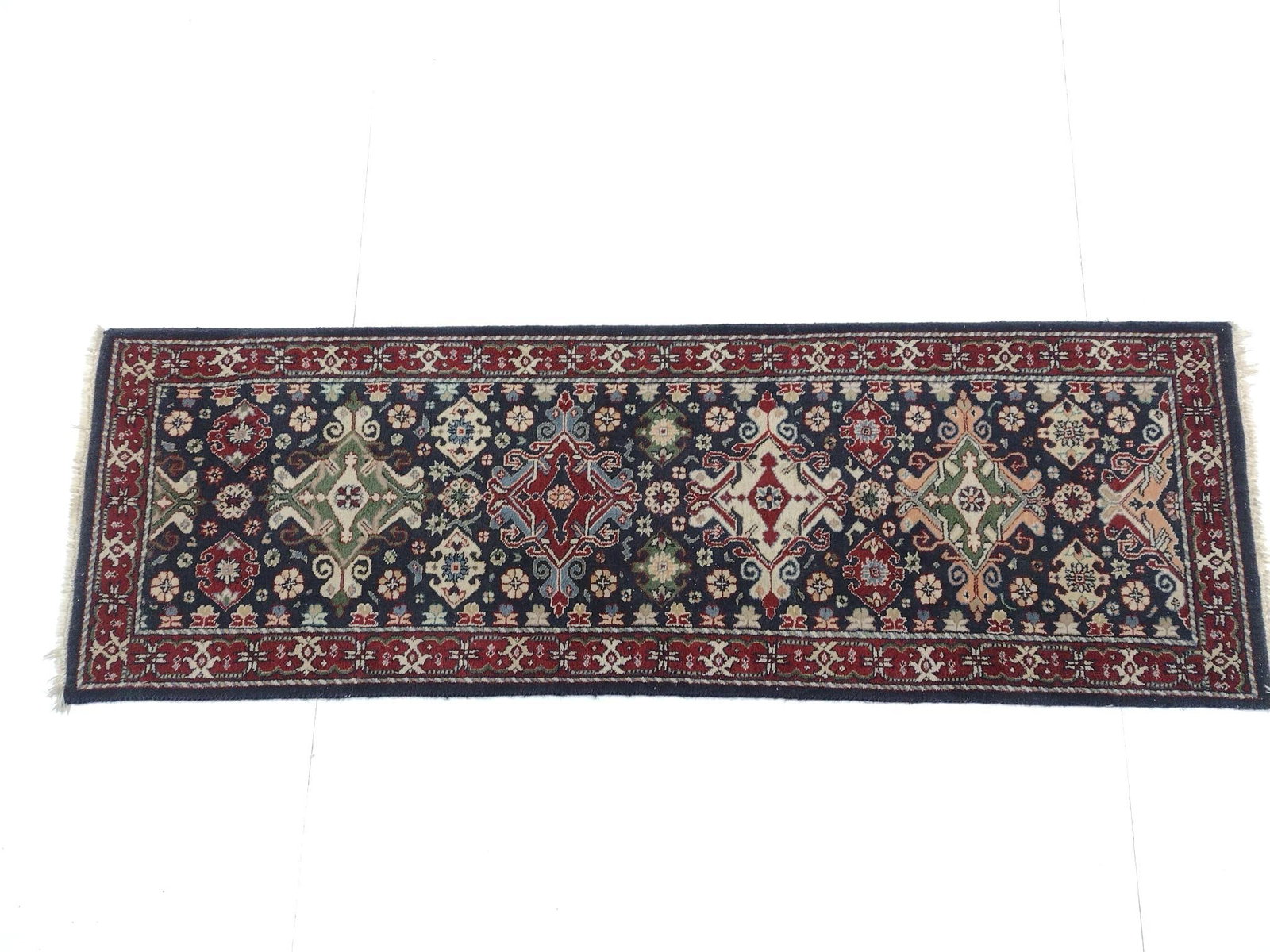 Persian Runner: 6' long X 2' wide. No manufactures name found.