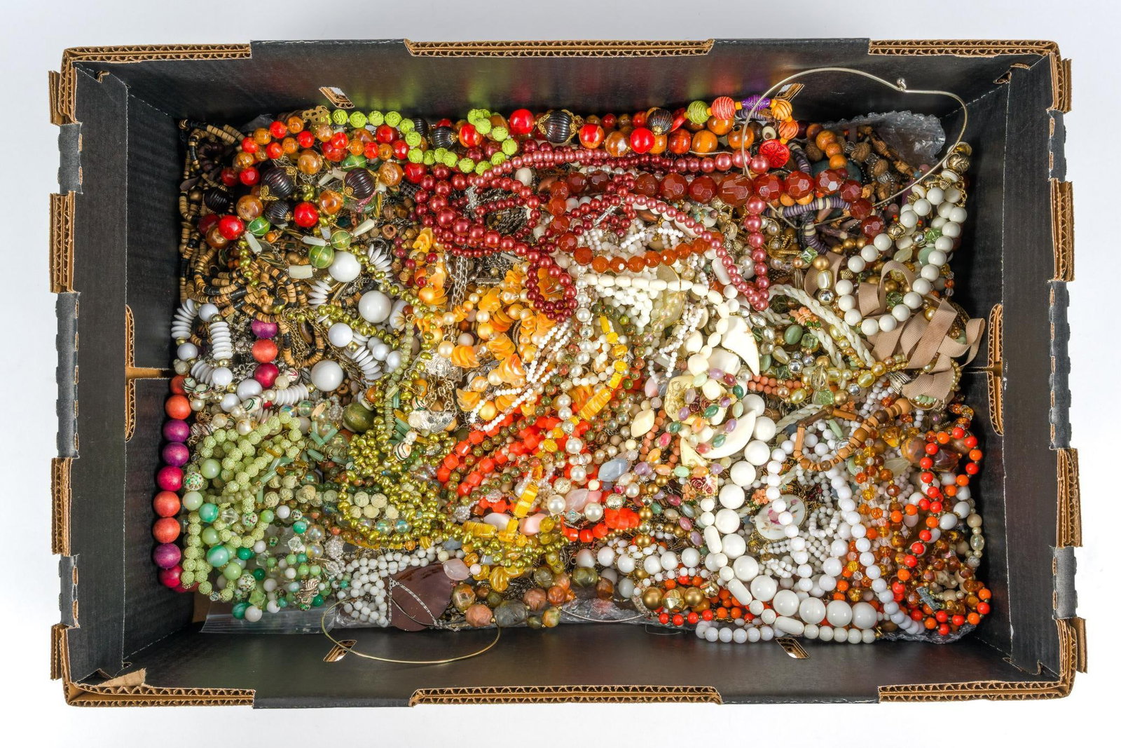 Assorted Costume Jewelry Necklaces: Varying styles and lengths.