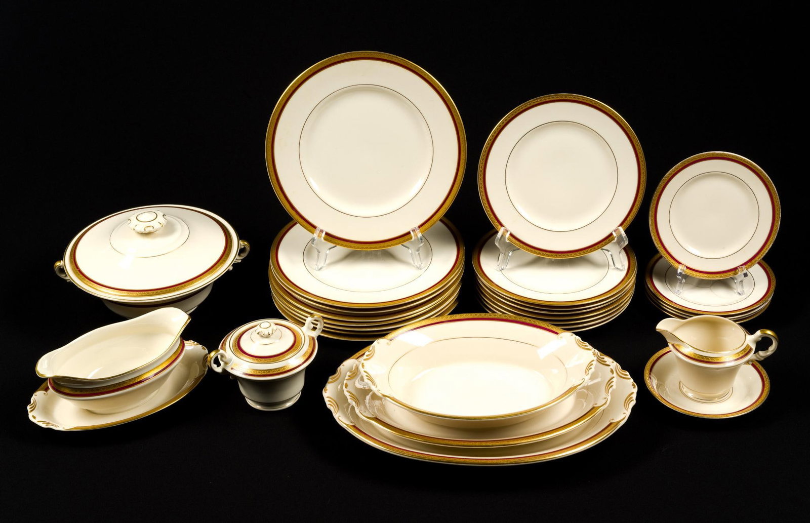30 Pcs Old Ivory by Syracuse China: The largest platter is 14" by 10 - 1/4", and the smallest saucer is 5 - 5/8" in diameter. No visible chips or cracks.