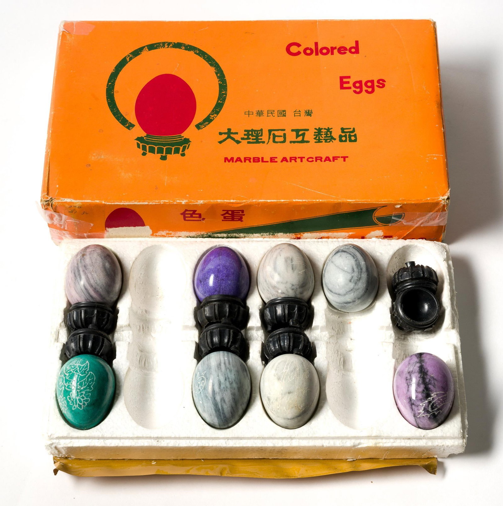 Eight Polished Marble Eggs: Also includes seven display pedestals. Box is 13" long, 3" deep and 7.5" in height.