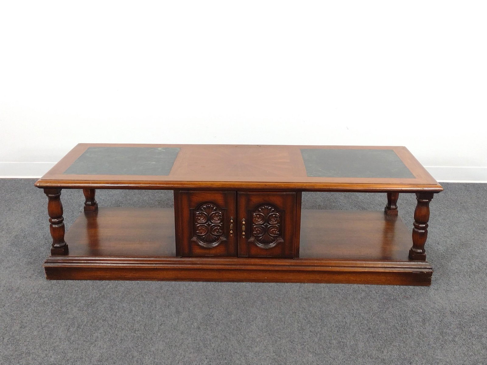Marble Top Coffee Table: 62" wide X 22" deep X 17-1/2" high. Has some light scratches and areas of finish loss.