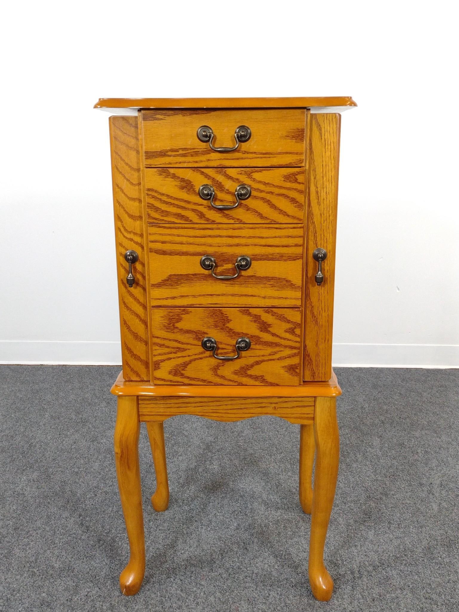 Jewelry Chest: 17" wide X 13" deep X 37-1/2" high. No manufactures name found.