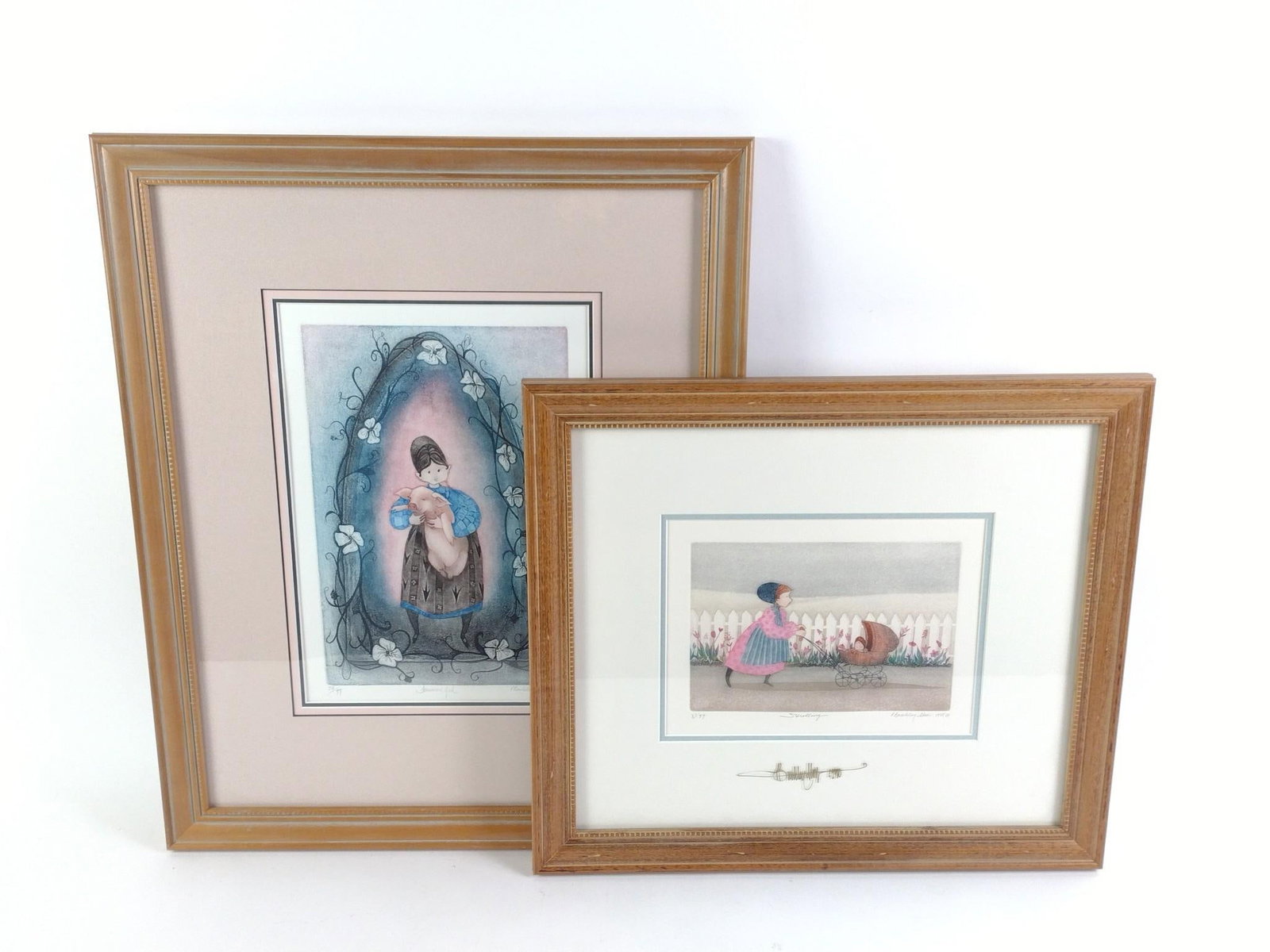 2 Buckley Moss Prints Incl. "Strolling": Also includes "Farmers Girl". Sight 6" to 12" high X 8" to 8-1/2" wide. Overall with frame 16-1/2" to 23" high X 19" wide. Both prints framed and signed.