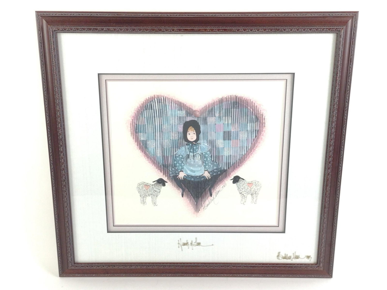 P. Buckley Moss (1933 - 2024) Watercolor "Heart of Love": Both artwork and frame are signed by artist. Overall with frame measures 23 - 1/2" by 22". Sight measures 13 - 1/2" by 12". Patricia Buckley Moss was born on Staten Island in 1933. After relocating