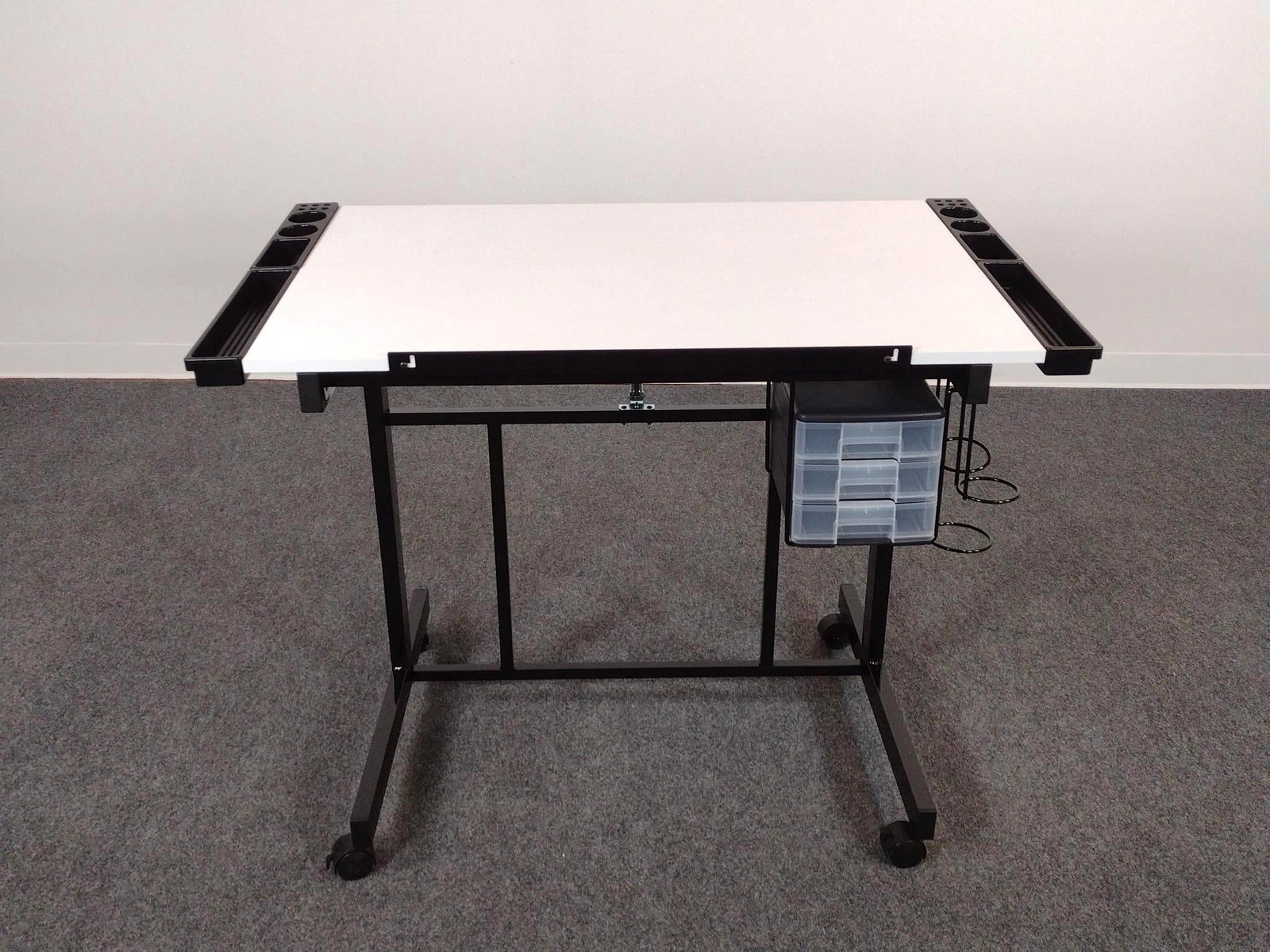 Studio Designs Drafting Table: 36" wide X 23-3/4" deep X 31" high.