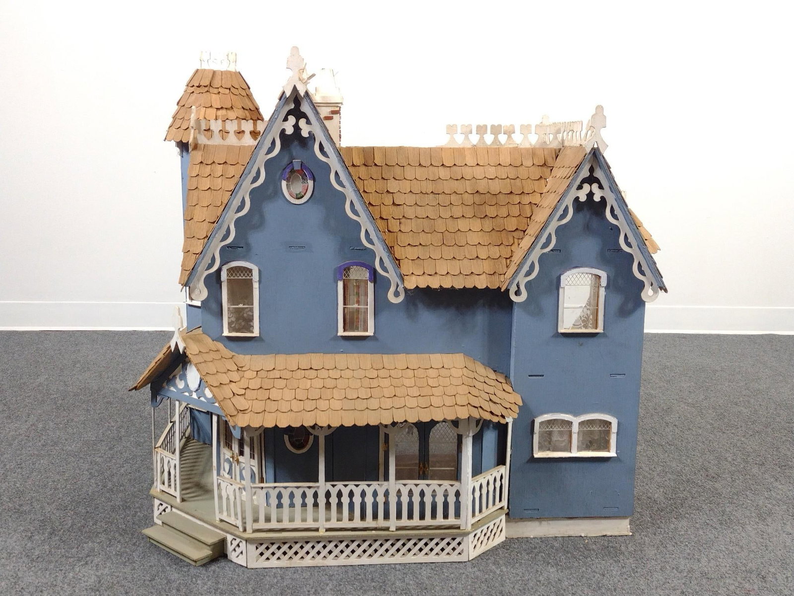 Handmade Doll House: 35" wide X 22" deep X 32" high. Some damage.