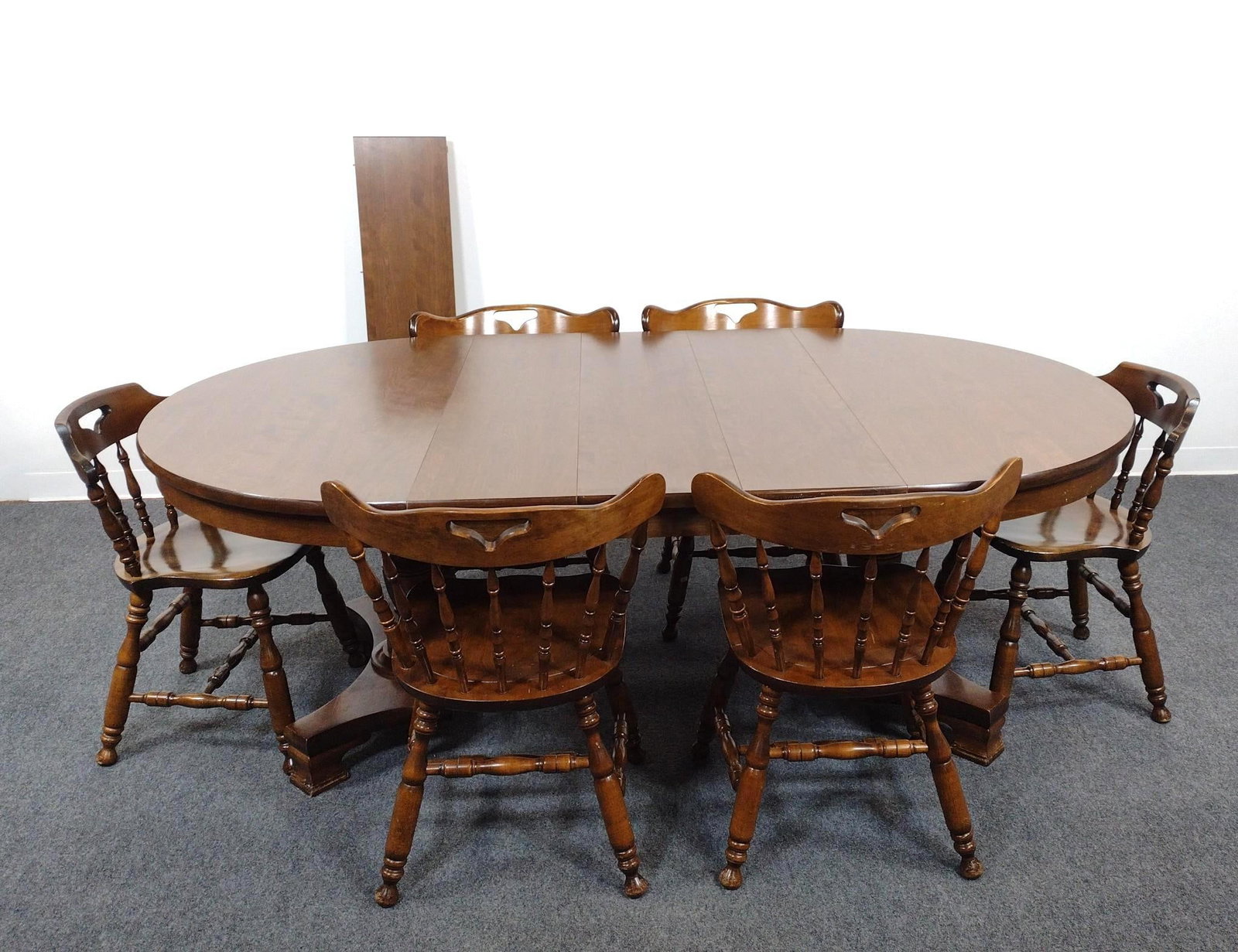 S. Bent & Bros Dining Table & Chair Set: Table 48" diameter X 29-1/2" high. 4 table leaves, each 11" wide. Chairs 20-1/4" wide X 16-1/2" deep X 29-1/2" to 31" high. All Pcs have some light scratches.