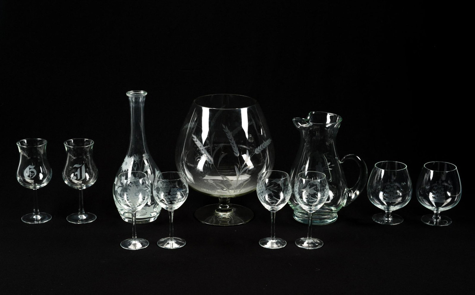 Lot of Etched Decorative Barware: Includes large brandy snifter, decanter and pitcher. Largest piece measures 11 - 1/2" tall 9" wide.
