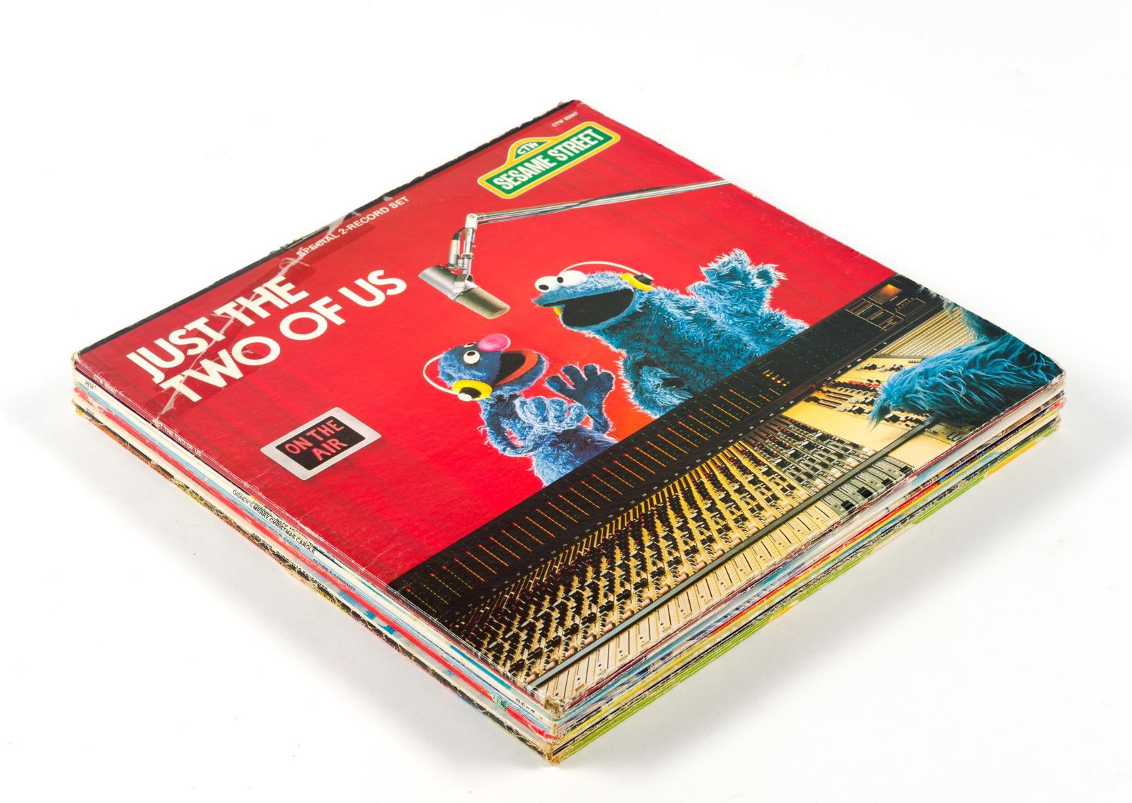 8 Children's Vinyl Records: Includes Sesame Street and Walt Disney characters. Each album measures 12 - 1/2" by 12 - 1/2".