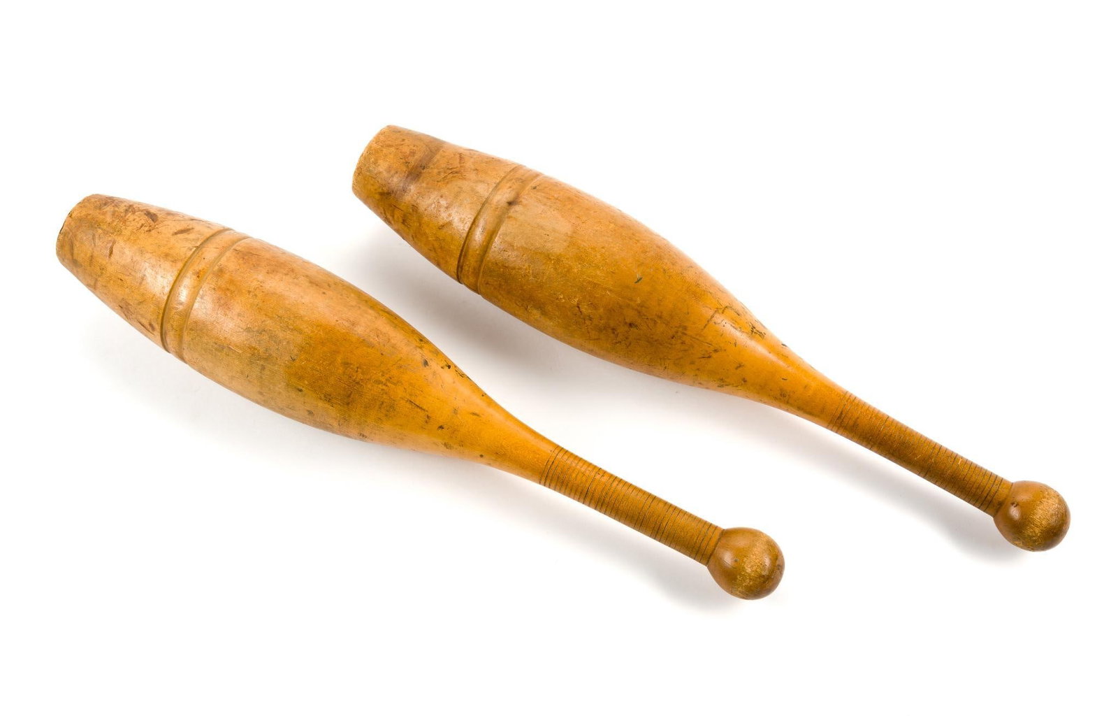2 Antique Wooden Juggling Clubs or Pins: Pins are 20" in length.