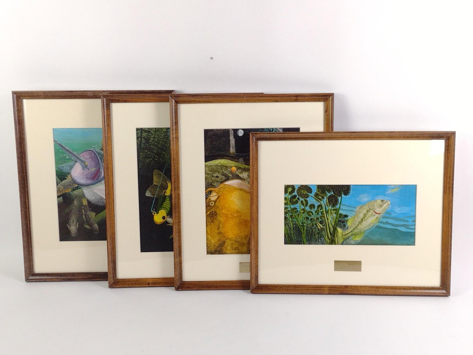 4 Ron Kuhn Fish Paintings: Overall 14-3/4" to 18-1/4" long x 15" to 18-1/4" wide, sight 5-1/2" to 11" long x 8" to 11-1/2" wide.