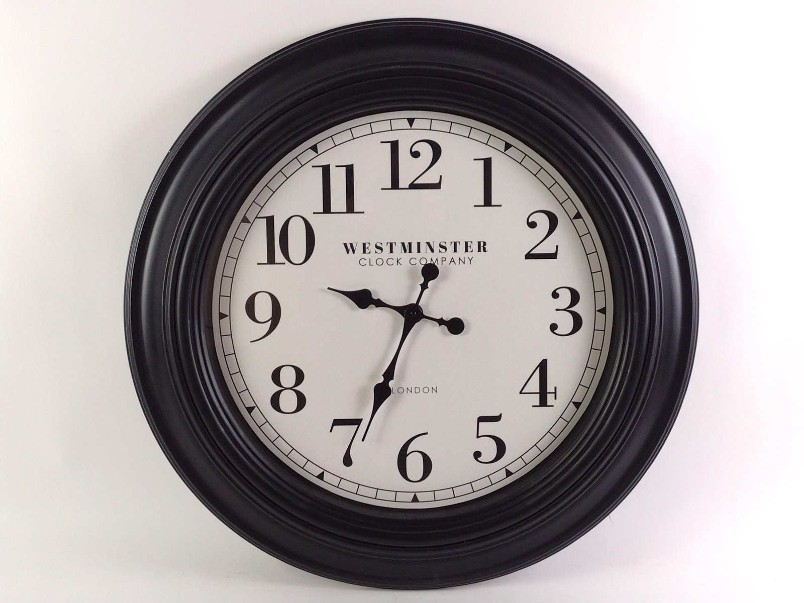 Westminster Clock Company Wall Clock: 31-1/2" long x 30" wide.