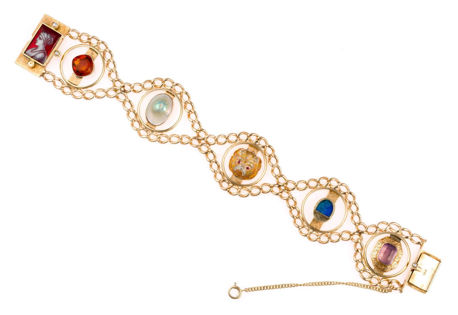 Antique 14K Gold Bracelet: Various gemstones, animal at center, and intaglio set to clasp. Safety chain. Early 19th century. Marked 14k. 7-3/4" long. 43.3 grams total.