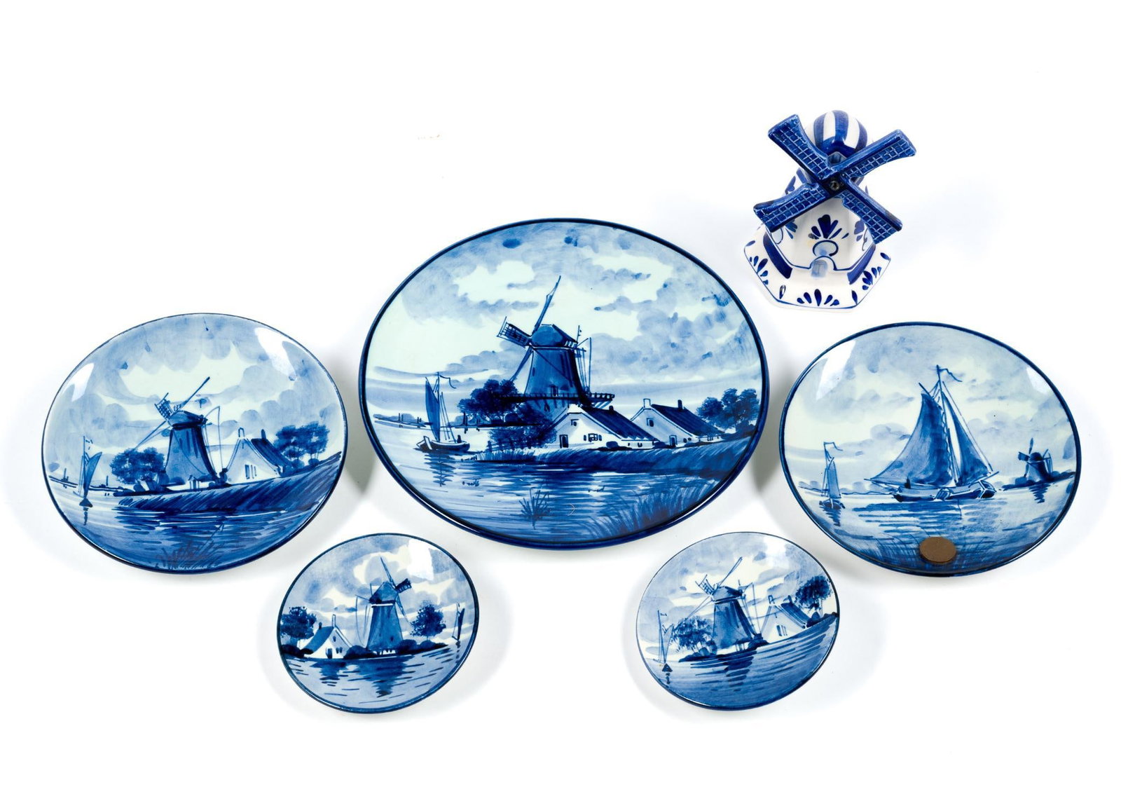 5 Porcelain Delft Holland Plates and Windmill: Largest plate measures 8" in diameter.