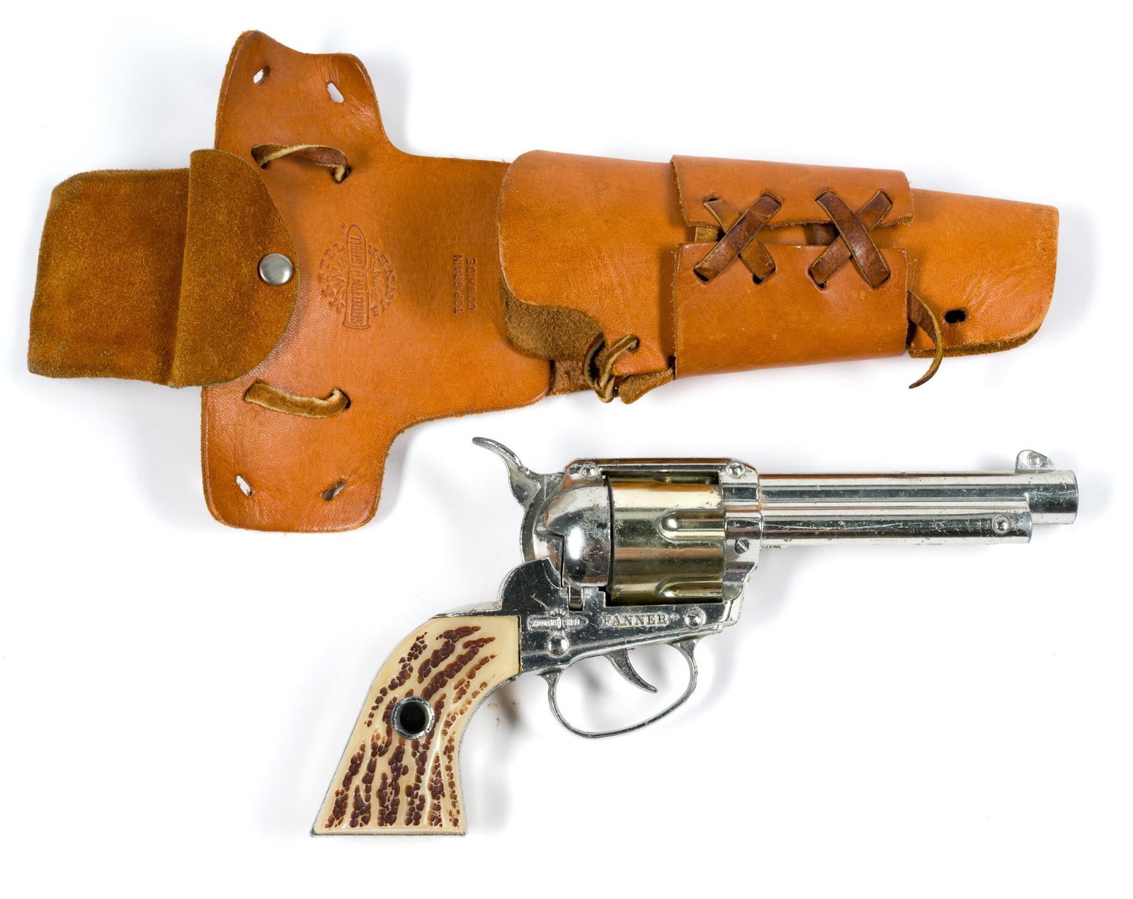 Matel "Shootin" Shell" Cap Gun and Leather Holster: Measures 10 - 1/2" in the holster.