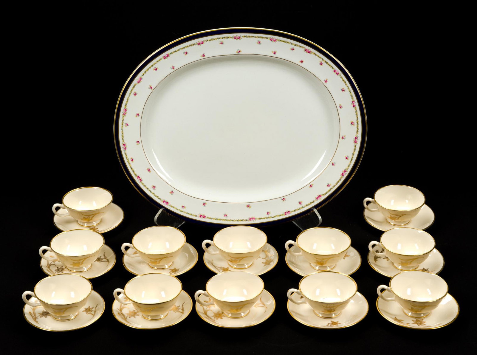Porcelain Platter & 12 Lenox Teacups and Saucers: Serving platter measures 19 - 3/8" x 15 - 5/8".