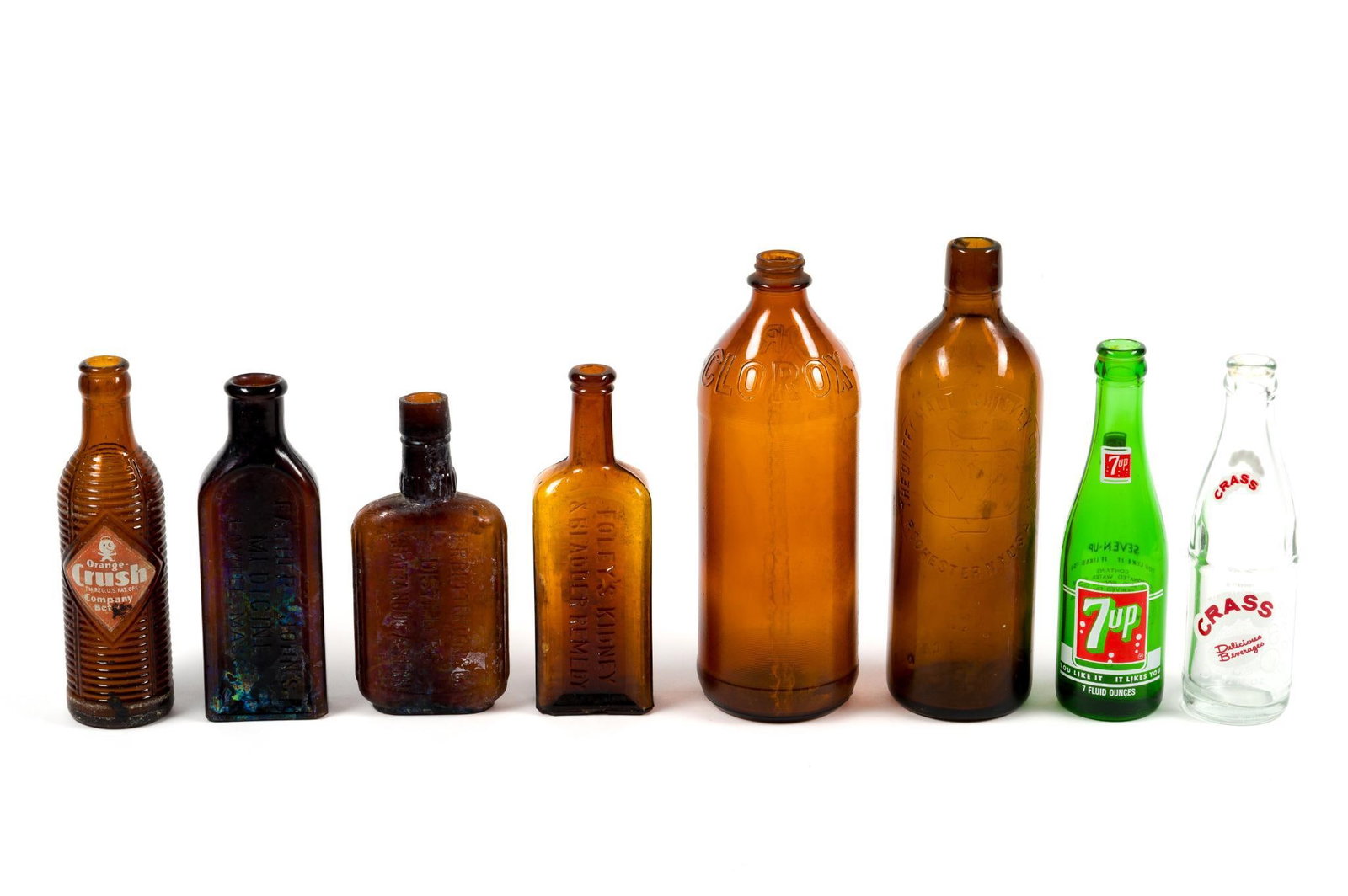 8 Vintage Glass Bottles Incl. Clorox: Also includes 7-Up and Orange Crush. Largest measures 10" x 3 - 1/2".