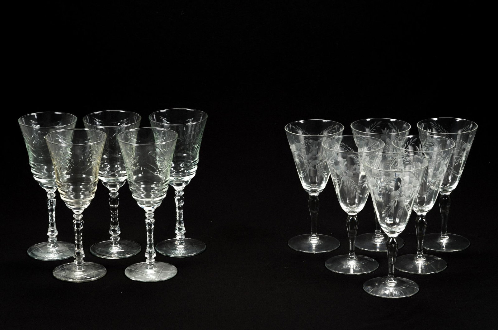 2 Sets of Etched Crystal Goblets: Cut glass stemware. Measures 3" x 7".