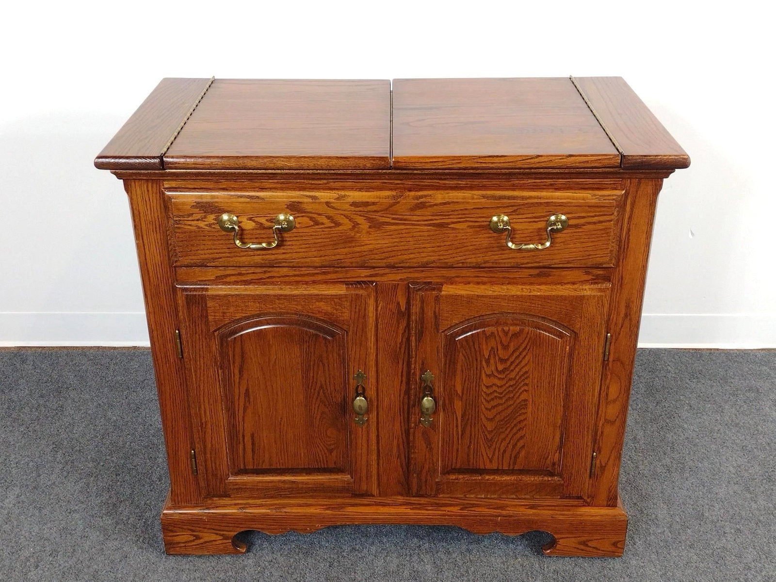 Nathan Hale Rolling Bar: Open 54-1/4" closed 35-1/4" wide X 18" deep X 32-1/4" high. Has some finish loss to top.