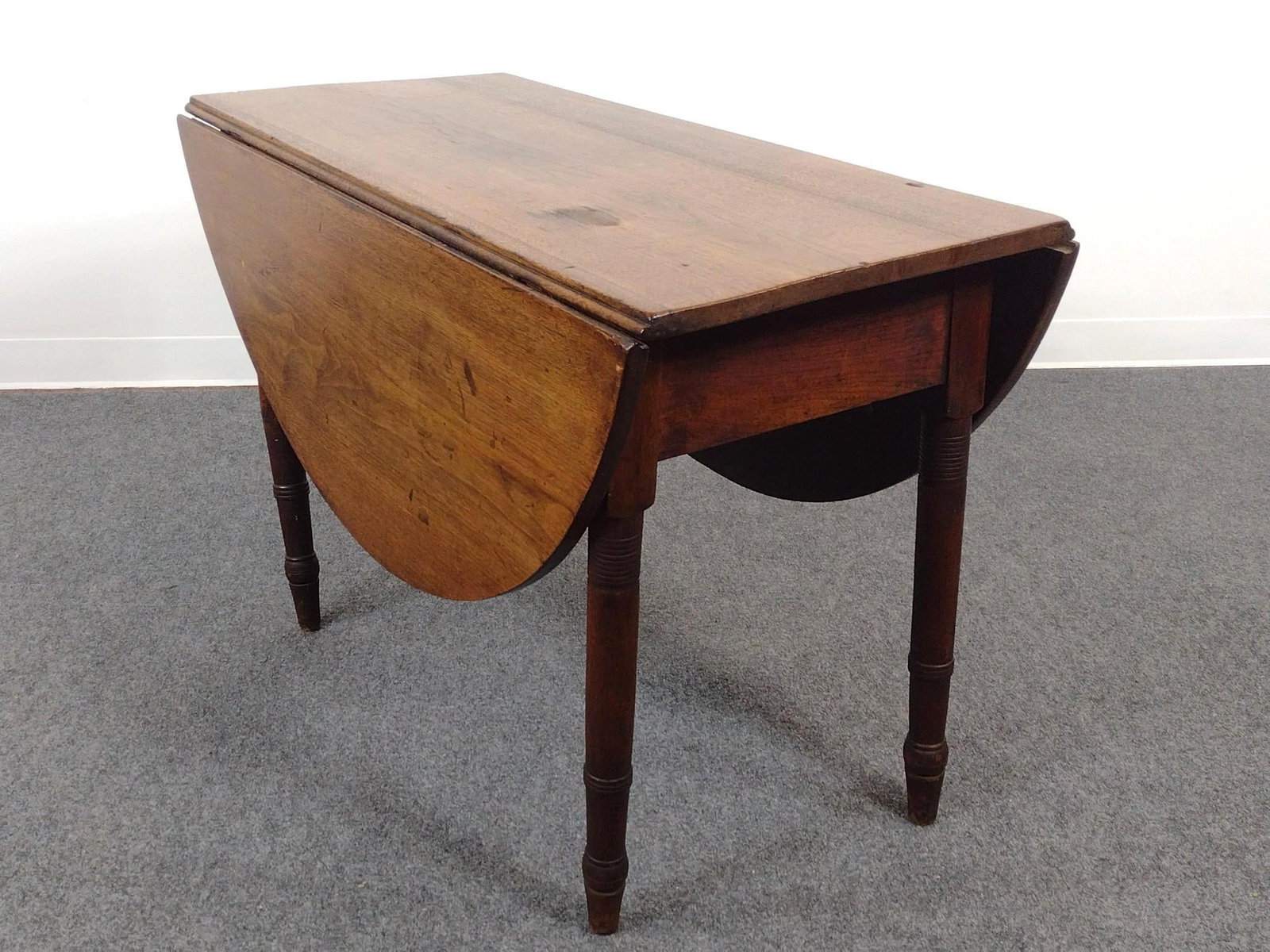 Drop Leaf Dining Table: Open 51", closed 20" wide X 43" deep X 28-1/4" high. Has wear consistent with age.