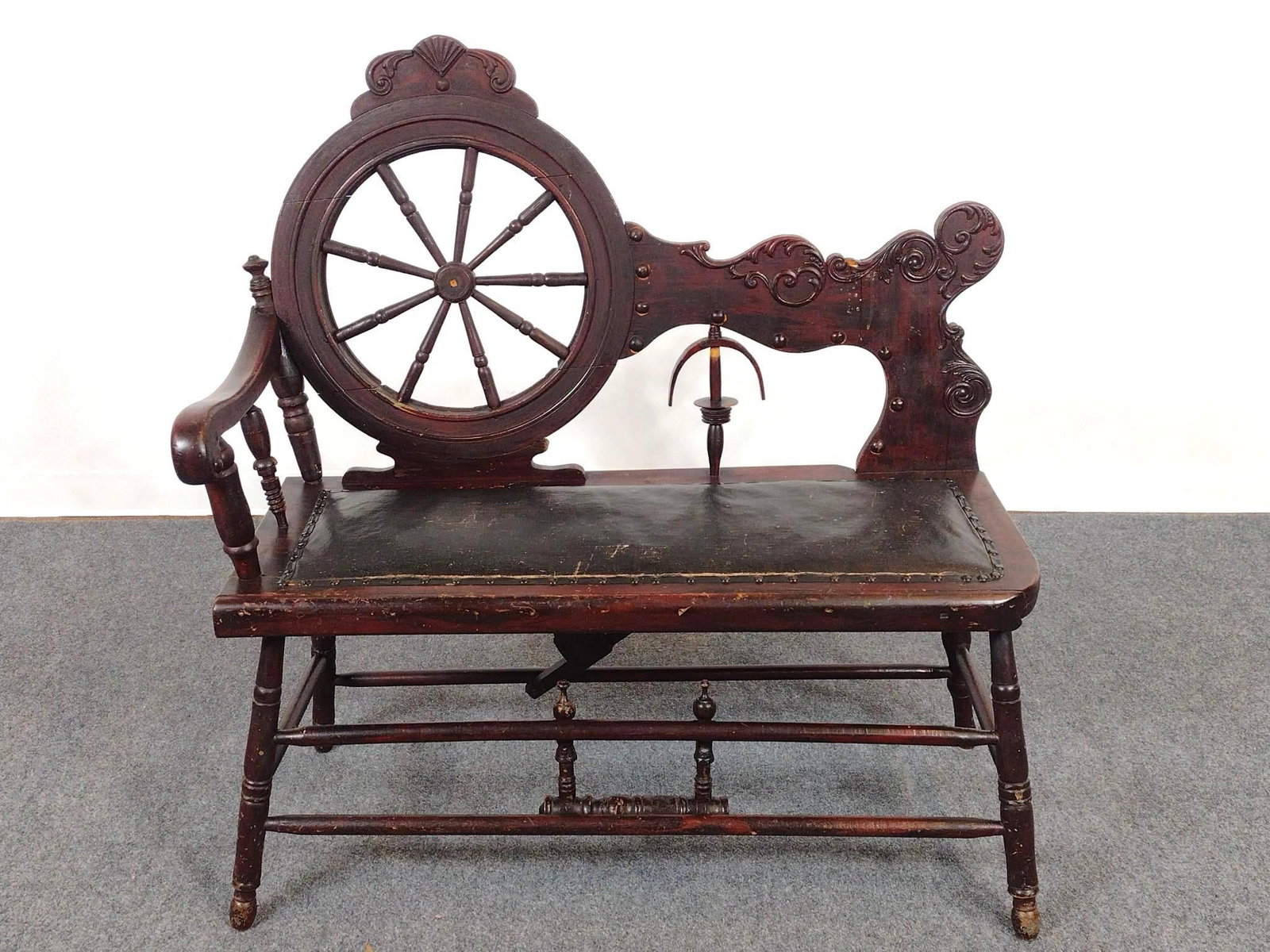 Spinning Wheel Bench: Leather seat. 40" wide X 17" deep X 42" high. Has scratches and finish loss.