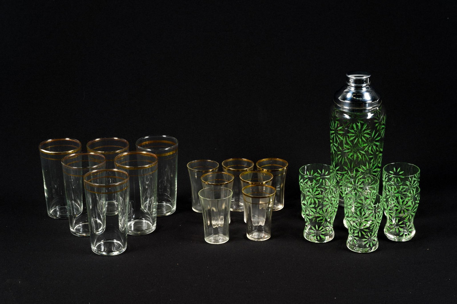 1930's Cocktail Shaker Set & Vintage Glassware: Also includes 2 matching sets of clear glasses. Shaker measures 3 - 1/2" x 8 - 1/2" x 3 - 1/2".
