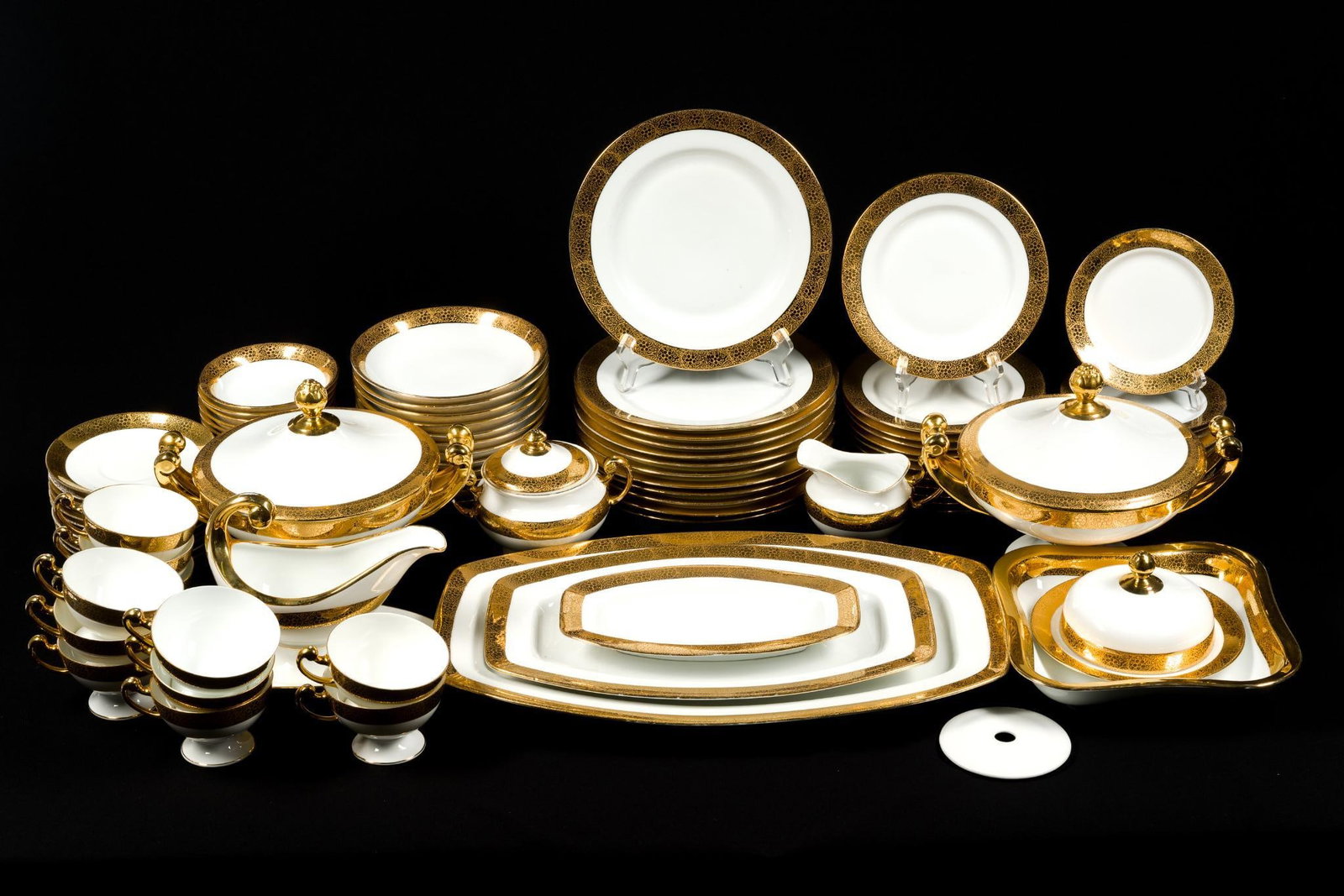 Hutschenreuther Bavaria 18K Gold Rimmed Dinner Service: Dinner plate measures 9 - 5/8" in diameter, largest oblong platter measures 19 - 3/8" x 12 - 3/8".