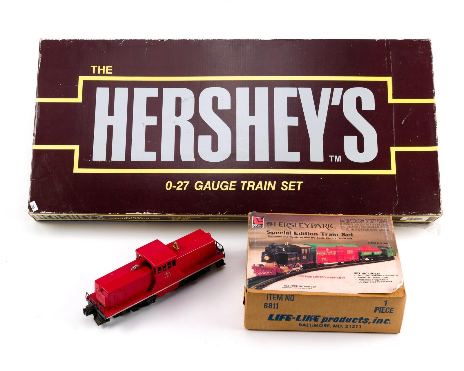 Hershey's Special Edition O-27 Gauge Train Set: Also includes Hershey Park Special Edition Train Set and a Lionel Lehigh Valley No. 627 44-Ton Switcher model. Box measures 33" x 4" x 15".