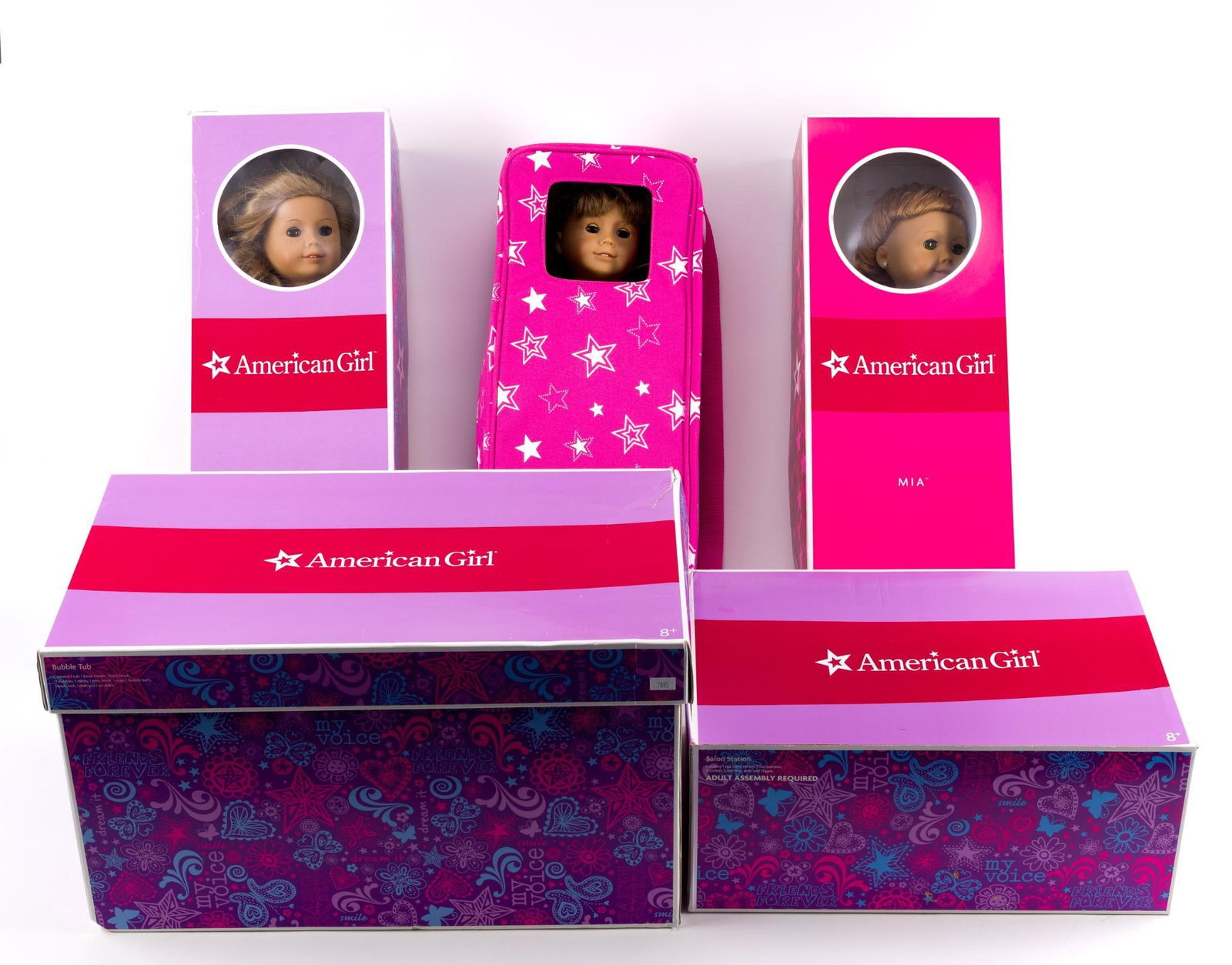 3 American Girl Dolls & Accessories: Includes vanity and tub. Dolls in original boxes, one with backpack carry bag. American Girl box measures 8" x 20" x 5 - 1/4"